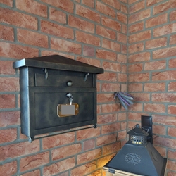 A wrought iron mailbox made in UKOVMI in Slovakia