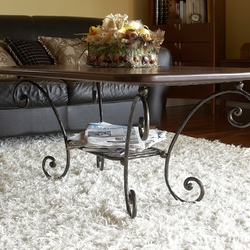 Forged table with a wooden design in the interior of the family house - high quality furniture  