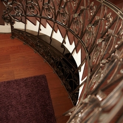 High quality arched railings for the staircase of a family house