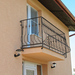 A wrought iron railing - log