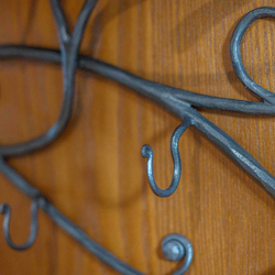 A hand wrought iron hanger