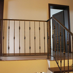 A wrought iron railing - An interior railing