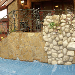 Rustic design of a winter garden with a pool made of products from UKOVMI 