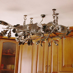 A hand-forged chandelier inspired by nature - luxury light