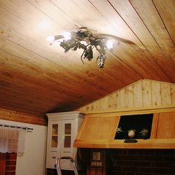 A hand forged chandelier in the summer kitchen