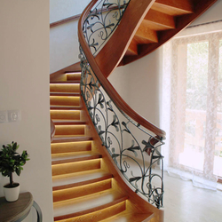 Spiral wrought iron railings combined with wood - Lily pattern