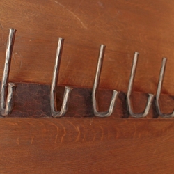 Forged wall hanger in copper patina  accessory to the hallway, waiting room...