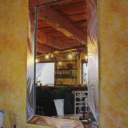 A modern mirror - a stainless steel mirror 