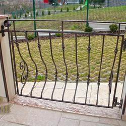 A wrought iron terrace gate