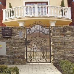 A decorative wrought iron gate