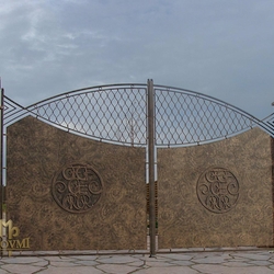 A wrought iron gate - metal with a logo - A luxury gate