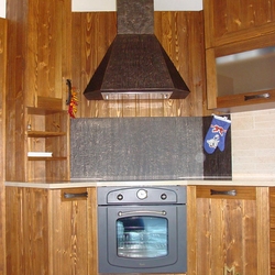 A kitchen wrought iron cooker hood