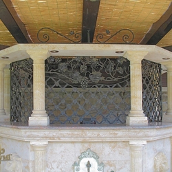 A wrought iron grille in a bar - a hint of ancient history