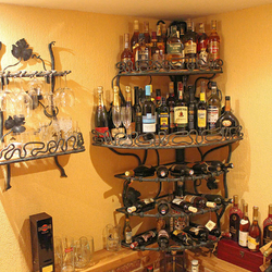A wrought iron rack - wine holder