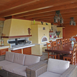 Wrought iron chandeliers in a summer house