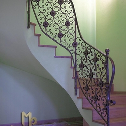 A wrought iron stair railing