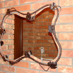 A wrought iron mirror frame - luxury mirrors