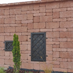 Forged door protecting a gas meter