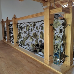 Luxury forged railing with natural vine theme in the interior of a family home