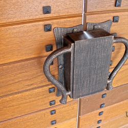 A wrought-iron box with an electric locker
