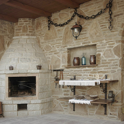 A hint of the Middle Ages - wrought iron fireplace accessories for a summer house