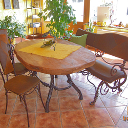 Exclusive wrought iron seating - a table, chairs and a bench Exclusive wrought iron seating - a table, chairs and a bench