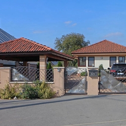 A modern wrought iron gate - stainless steel - iron combination