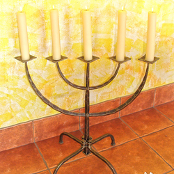 A wrought iron candleholder