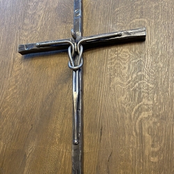Forged wall cross – a symbol of Christianity