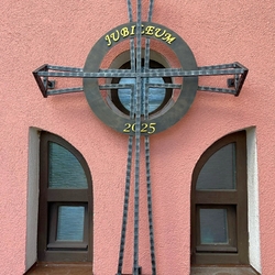 Wrought iron wall cross on the Home of Peaceful Old Age in Lipany, Slovakia