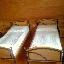 Forged beds with a wooden design - quality furniture