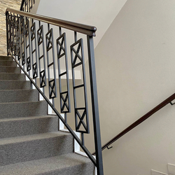 Simple metal railing with wooden handrail – interior staircase railing