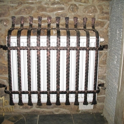 A wrought iron radiator cover