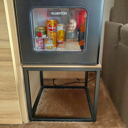 The simple metal table under the fridge – modern hotel furniture