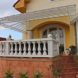 Roofing of the terrace in white color - forged shed from UKOVMI