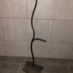 Forged artistic stand, shaped as a tree branch for bathrooms and WC