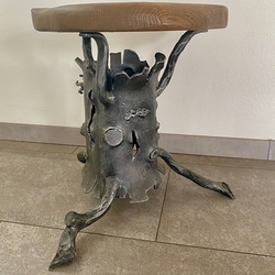 A luxury design chair forged like a tree stump A luxury design chair forged like a tree stump