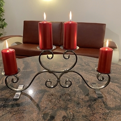 Forged Advent candleholder for moments of peace, love, and joy