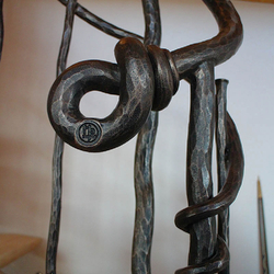A wrought iron knot on a railing